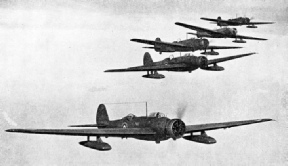 THE CONTAINERS BELOW THE WINGS of these Vickers Wellesley long-range bombers are streamline containers for the bombs