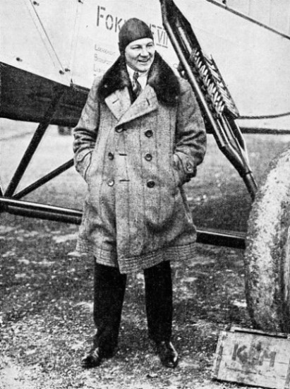 Anthony Fokker, standing beside the landing gear of one of his early air liners