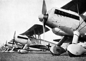 SQUADRON OF GERMAN SINGLE-SEAT FIGHTERS lined up on the aerodrome at Dortmund