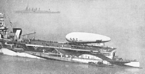AN EXPERIMENTAL LANDING of a non-rigid airship on the deck of H.M.S. Furious