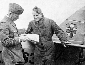 THE OPEN BOOK at the top of the squadron badge seen in this photograph is an appropriate symbol for the University of London Air Squadron