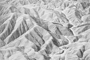 DISCOVERED BY AIR. This wall, running alongside the dry bed of a tributary of the River Santa, Peru