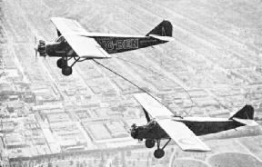 AN AEROPLANE RECEIVING PETROL while in flight