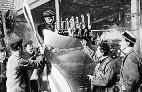 MECHANICS AT WORK ON LATHAM’S MACHINE, Rheims 1909