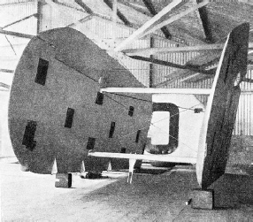 THE UPPER AND LOWER WINGS of either side of the machine are joined together by their struts and wires