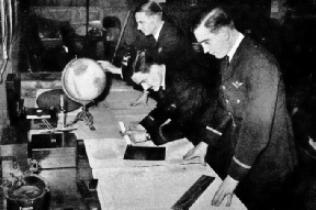 STUDYING NAVIGATION at the Imperial Airways training school at Croydon