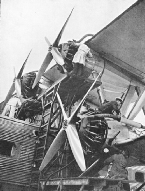 THE OVERHAUL OF A LANDPLANE used by Imperial Airways is carried out in hangars at Croydon Airport