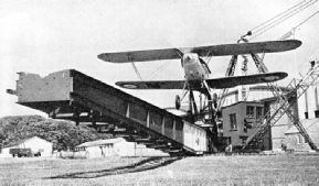 THE PILOT FULLY OPENS THE THROTTLE just before the catapult is released