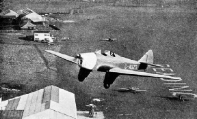 A MILES HAWK MONOPLANE climbing up from Reading Aerodrome