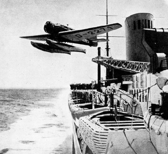 AN AEROPLANE CARRYING MAIL is regularly catapulted from the German liner Bremen