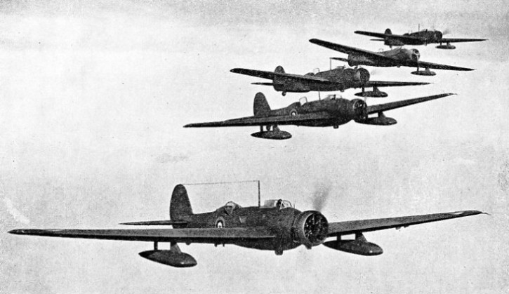 THE CONTAINERS BELOW THE WINGS of these Vickers Wellesley long-range bombers are streamline containers for the bombs