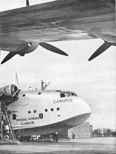 THREE PAIRS OF WHEELS are attached to the hull of a flying boat to enable the aircraft to be pulled out of the water and up the slipway