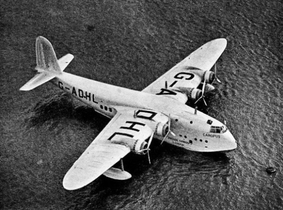 A FLYING BOAT moored on the water shows the same distinguishing lights at night as those shown by a ship