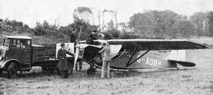 WHEN TWO PASSENGERS are to be carried in a chartered aeroplane, the Leopard Moth is a particularly suitable machine